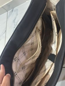 Chic Black Tote Bag with Sunflower Charm