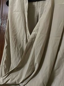 Elegant Sleeveless Drape Top