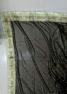 Grand netted tan and coffee brown saree