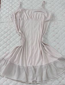 Chic Cream Slip Dress with Ruffle Hem
