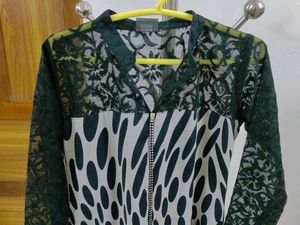 Black Polka Dot Kurti With Colorful Designs At Bottom