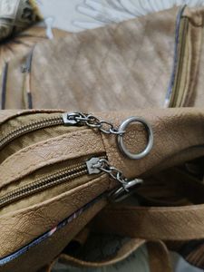 Brown Backpack with 3 chains ⛓️ space
