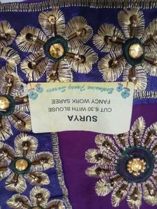 Elegant Purple Saree with Embellishments