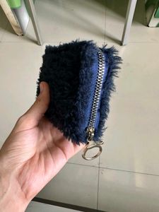 dark blue faux fur and embroidered cat feature