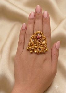 Exquisite Gold Toned Ring with Bells