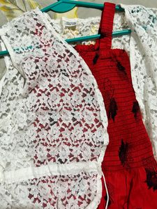 red coloured fit and flare dress with lace shrug