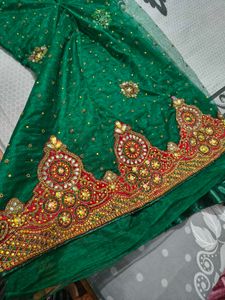 Ravishing Heavy Green Net Saree