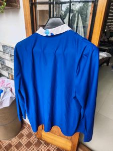 Blue Floral Button-Down Top attached with coat