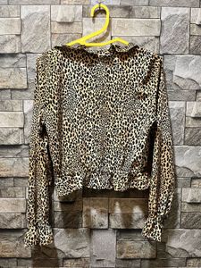 Leopard Print Ruffle Long Sleeve Top