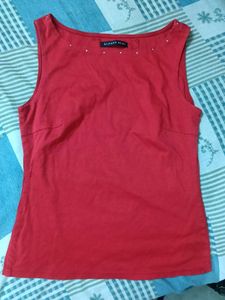 Red Sleeveless Top with Embellishments