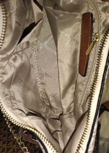 Micheal kors Jet set slingbags