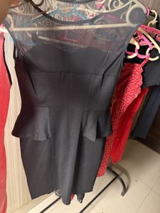 Chic Black Sheer Neckline Peplum Dress