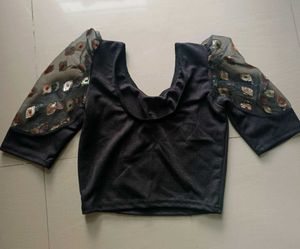 Elegant Black Blouse with Sheer Sleeves