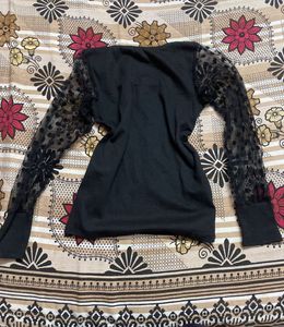 Elegant Black Top with Lace Sleeves