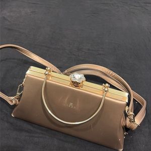 Elegant Rose Gold Clutch Bag