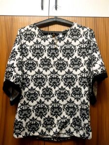 Elegant Black & White Patterned Top