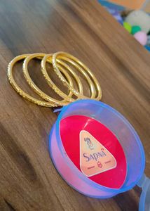 Set of Four Gold Bangles