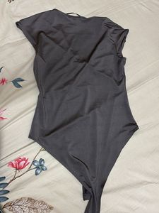 Sleek V-Neck Cap Sleeve Bodysuit