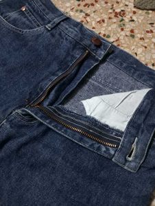 Flared Denim Jeans with Frayed Hem