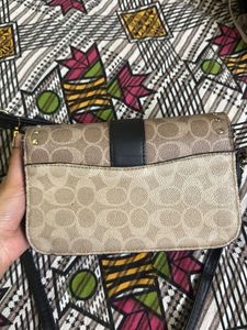 Signature Canvas sling Bag