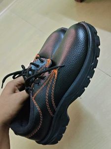 Black Shoe with Orange Stitching