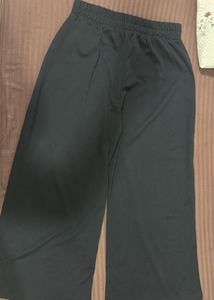 Chic Wide-Leg Black Pants with Gold Buckle
