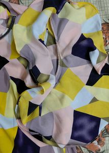 Vibrant Geometric Print Ruffle Top