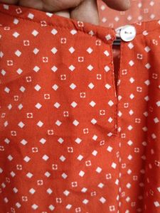Chic Orange Polka Dot Top