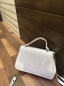 Chic White Handbag with Gold Chain Detail