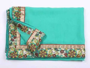 Stunning Teal Saree with Floral Border