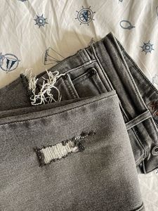 Grey Flare Jeans with Distressed Details