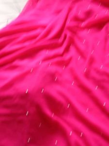 Vibrant Pink Saree with Pearl Embellishments