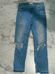 Ripped Knee Jeans