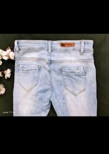 Light Wash Distressed Denim Jeans