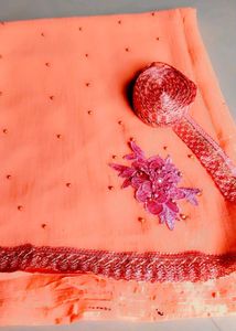 Beautiful Peach Saree with Embellishments
