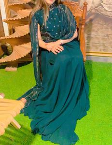 Elegant Emerald Green Gown with Embellishments