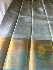 Exquisite Grey Silk Saree with Gold Border