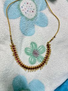 Elegant Ruby & Pearl Necklace