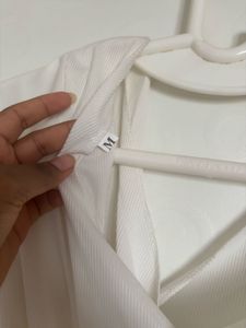 Chic White Long-Sleeve Bodysuit