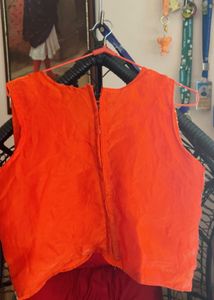 Flowing Orange Ethnic Skirt with choli and jacket