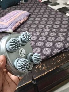 Portable hair massager