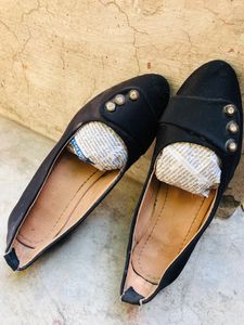black platform with stone