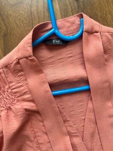 Elegant Peach Blouse with Tie Detail