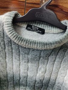 Stylish grey and white sweater