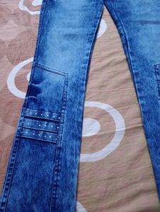 Stylish Blue Wash Jeans with Embellished Details