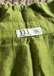 Green shirt with embroidery