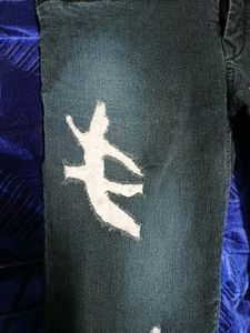 Distressed High-Waisted Skinny Jeans