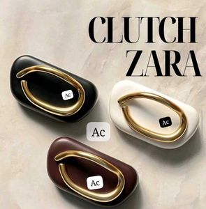 Elegant Brown Clutch with Gold Accent