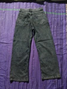 A charcol colour jeans with comfortable material.