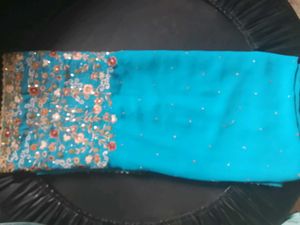 Stunning Embroidered Teal Saree